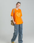 MONCHI™ T-SHIRT ORANGE LETTRE