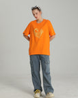 MONCHI™ T-SHIRT ORANGE LETTRE