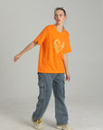MONCHI™ T-SHIRT ORANGE LETTRE
