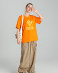 MONCHI™ T-SHIRT ORANGE INITIAL